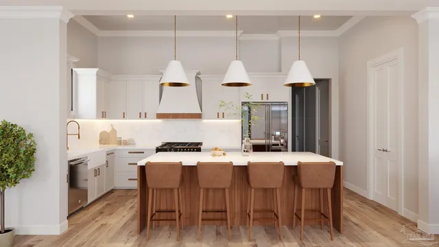 a kitchen with stainless steel appliances a table chairs wooden floors and a view of living room