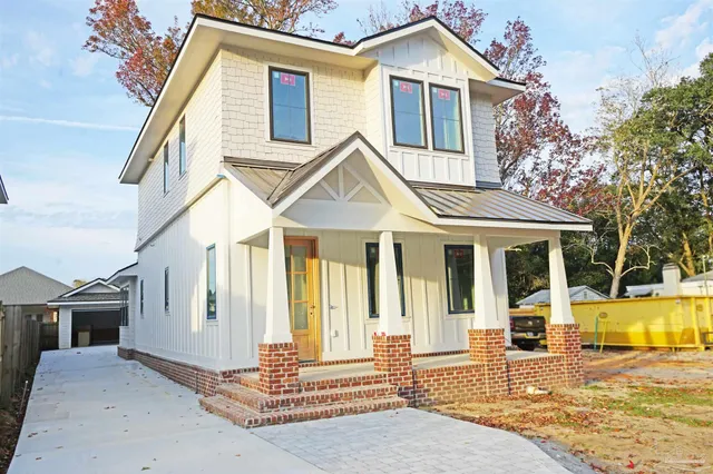 a front view of a house with a patio
