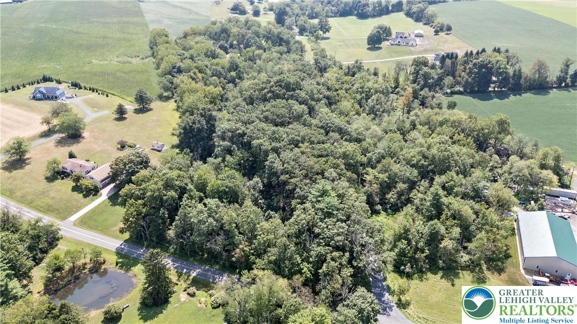 an aerial view of residential house with outdoor space