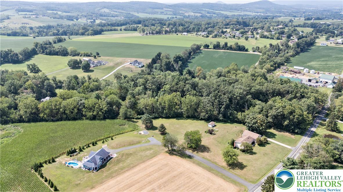 7531 Borman Road New Tripoli, PA 18066 - Photo 8 of 13 an aerial view of a house with outdoor space and lake view