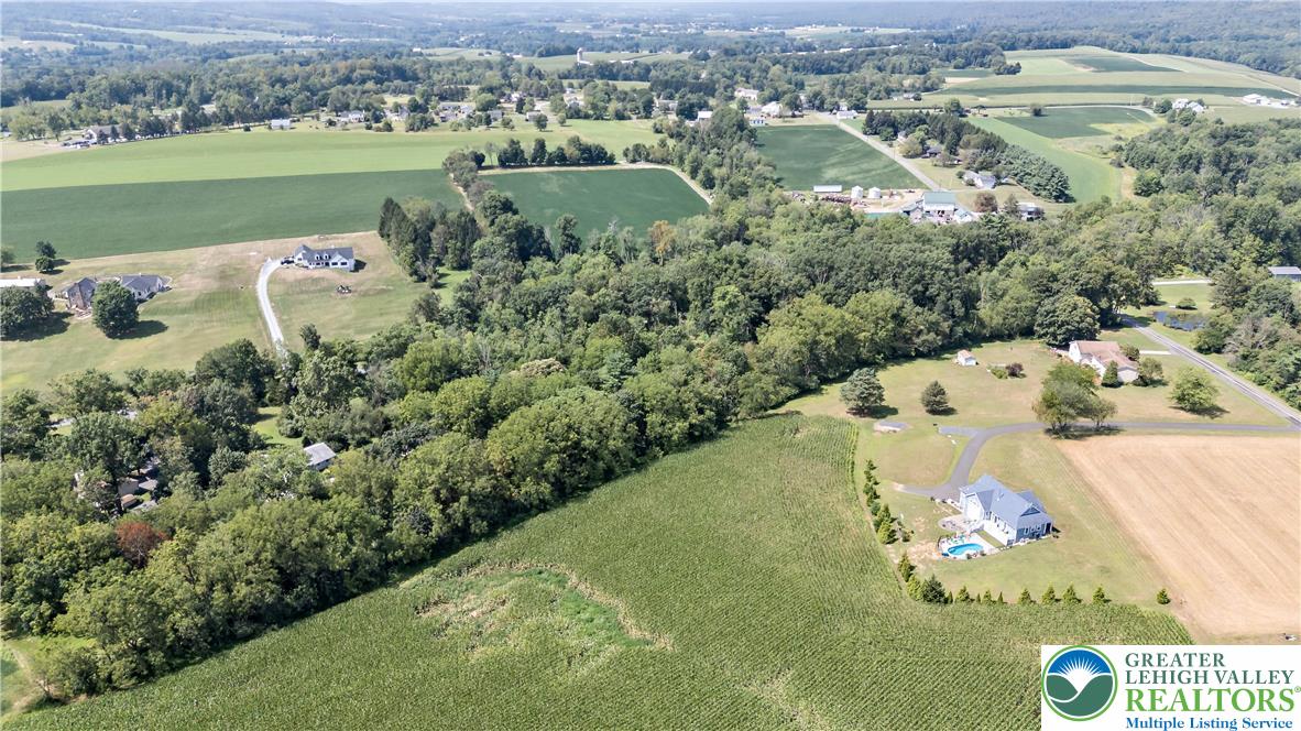 7531 Borman Road New Tripoli, PA 18066 - Photo 9 of 13 an aerial view of a house with a yard