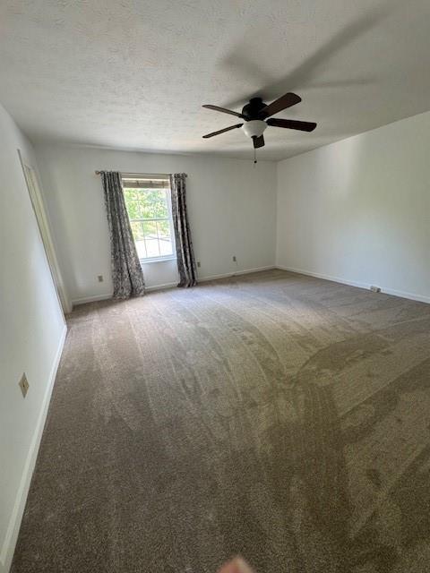 1003 Rural Ridge Drive Cheswick, PA 15024 - Photo 18 of 30 en empty room with windows and ceiling fan view