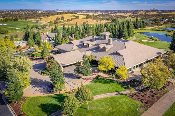 a view of a swimming pool with a terrace