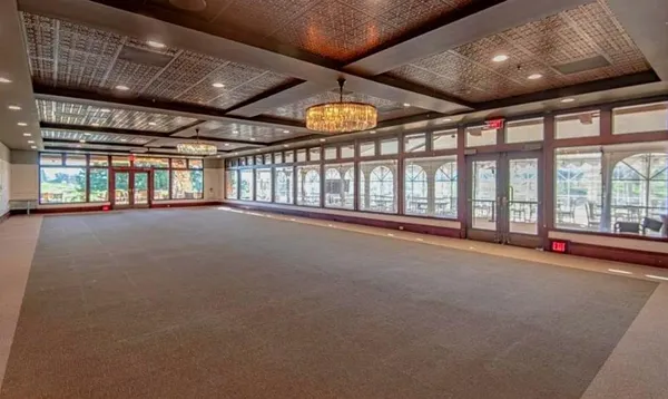 an aerial view of residential houses and city street