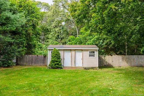 a house view with a garden space