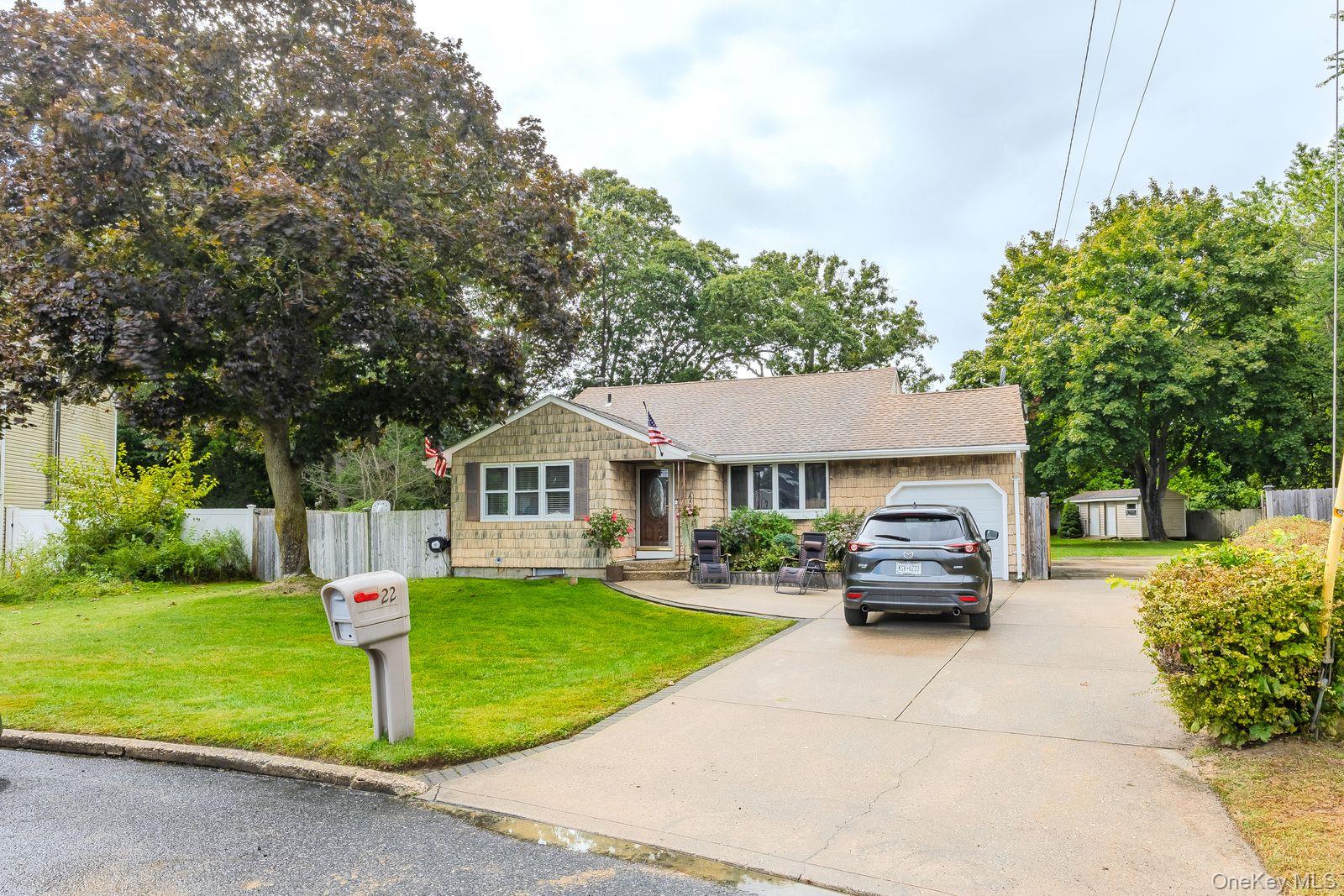 22 Larry Road Selden, NY 11784 - Photo 34 of 36 a house view with a garden space