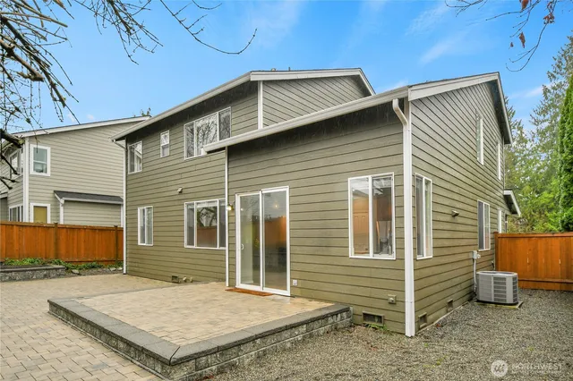 a front view of a house with parking space