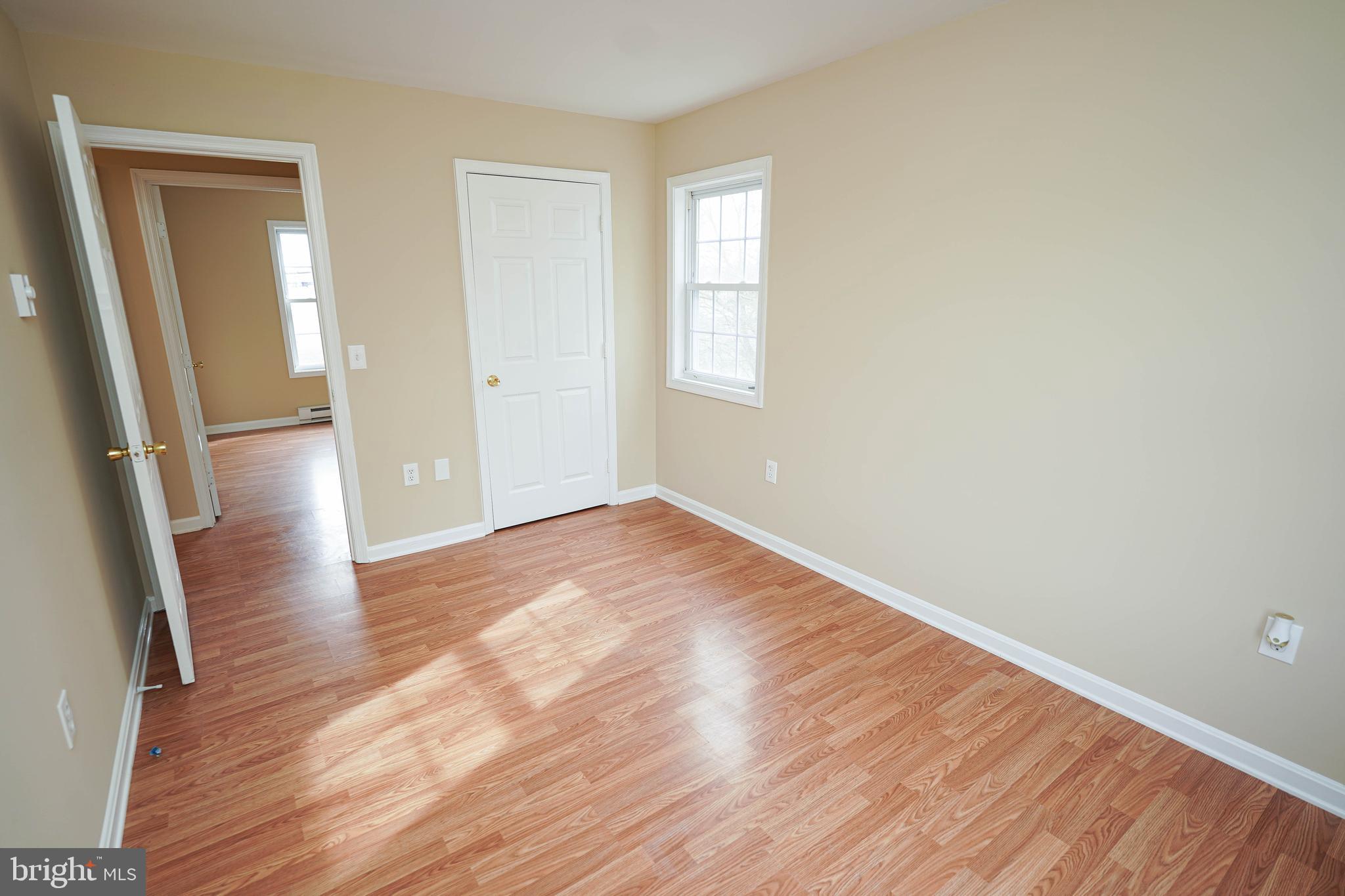 7526 Bethel Road Willards, MD 21874 - Photo 18 of 34 wooden floor in an empty room with a window