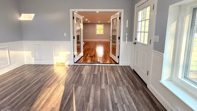 a kitchen with a stove a sink and a microwave