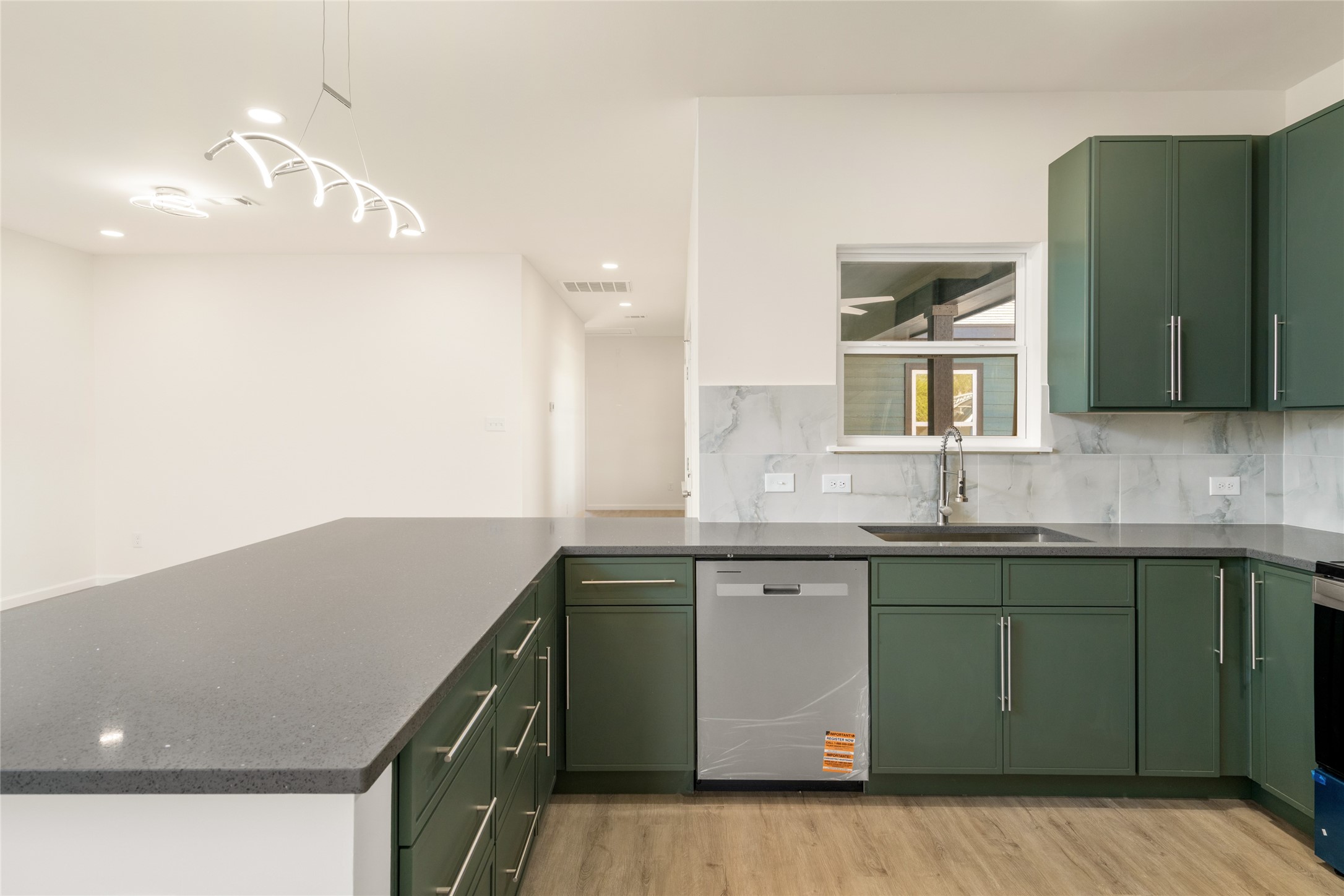 4656 North Teague Street Rosharon, TX 77583 - Photo 14 of 41 Ample cabinet and counter space make this kitchen as functional as it is stylish.