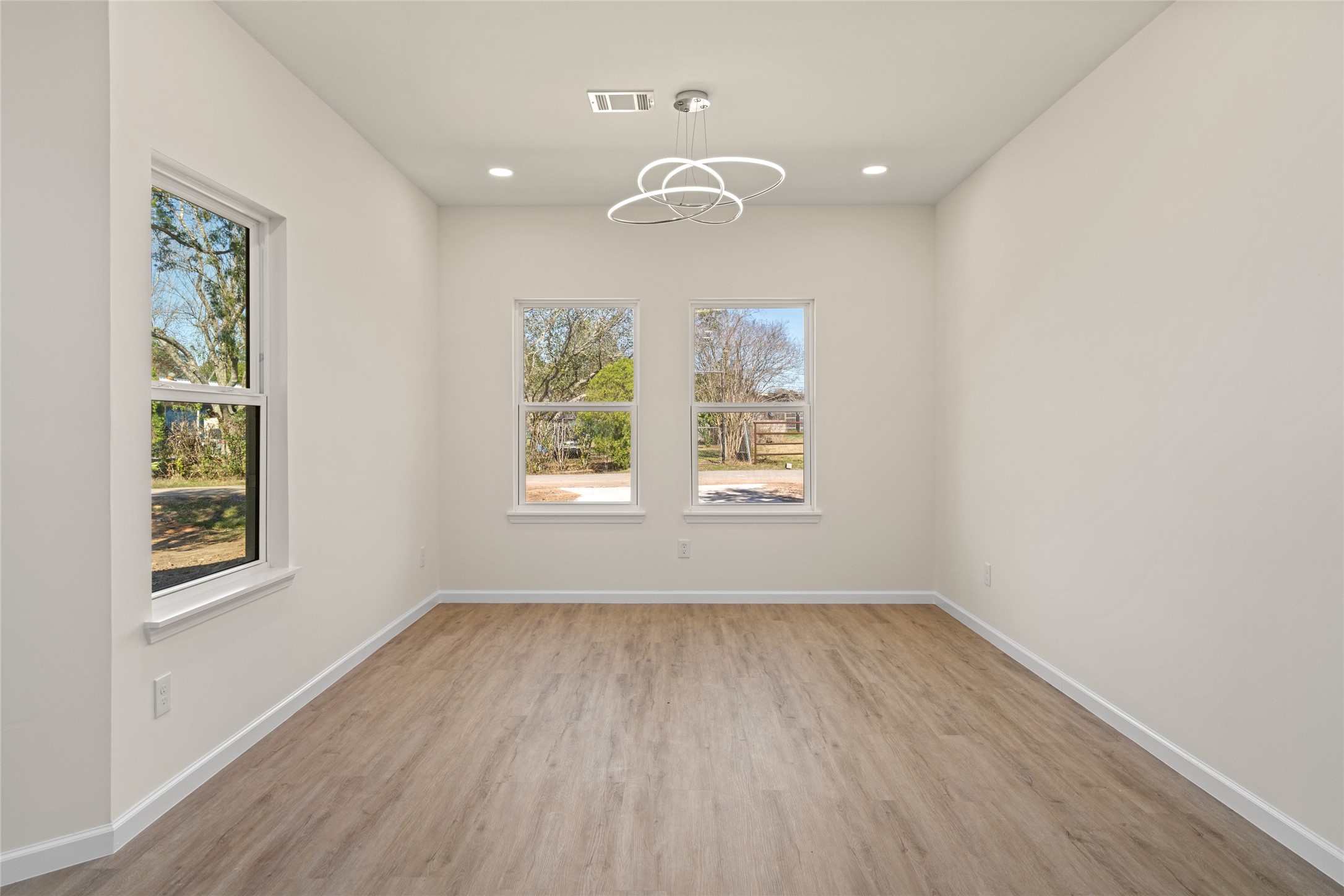 4656 North Teague Street Rosharon, TX 77583 - Photo 41 of 41 Large windows and open floor plan create a bright, airy feel throughout.