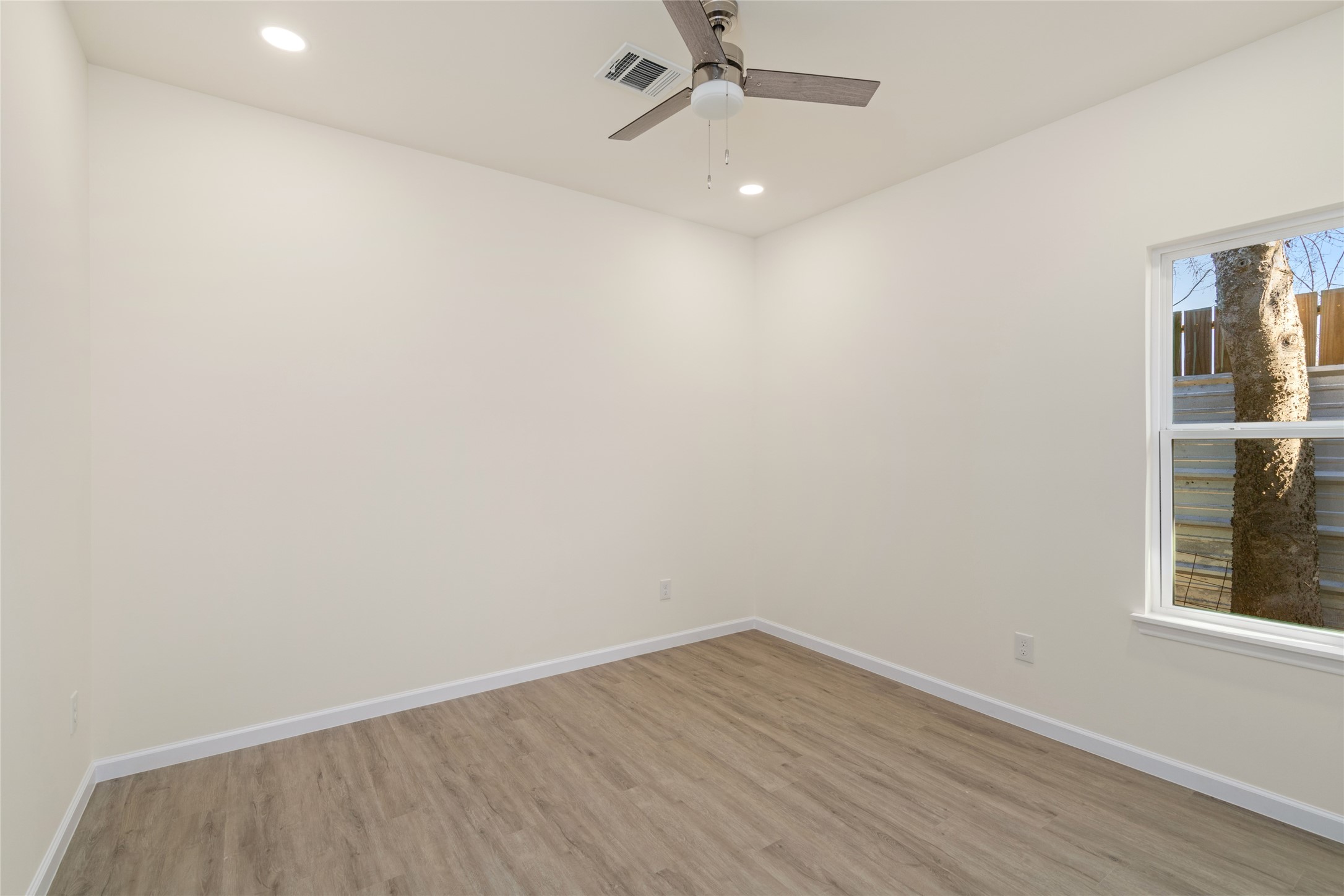 4656 North Teague Street Rosharon, TX 77583 - Photo 35 of 41 Generously sized bedroom with neutral tones and plenty of natural light.
