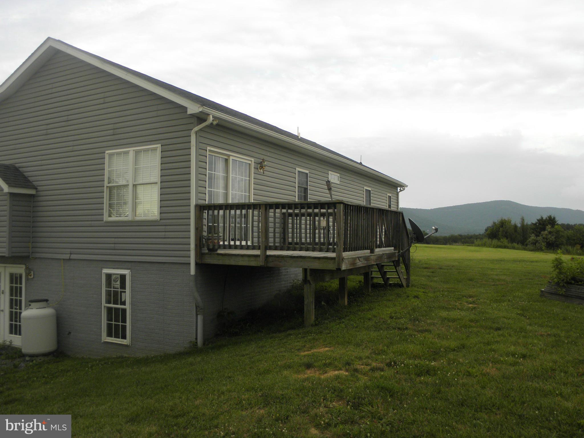 208 John Rice Road Front Royal, VA 22630 - Photo 3 of 21 a view of a house with a yard