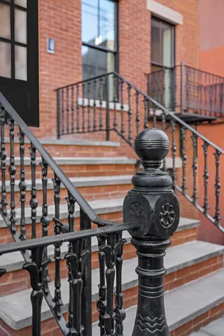 a bathroom with a granite countertop sink toilet a large mirror a shower and a bathtub