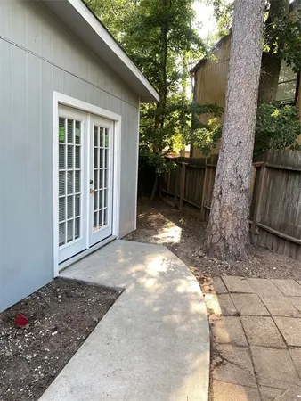 a view of backyard with green space