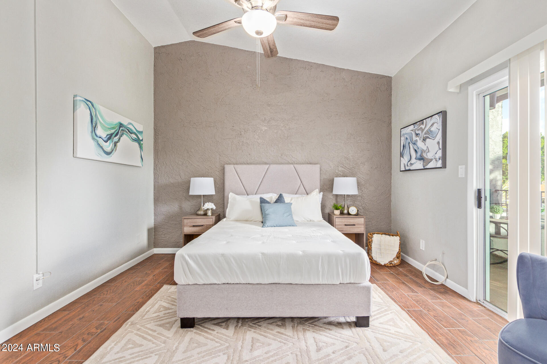 1602 East Ocotillo Road, Unit 121 Phoenix, AZ 85016 - Photo 14 of 31 a bedroom with a bed and a chandelier