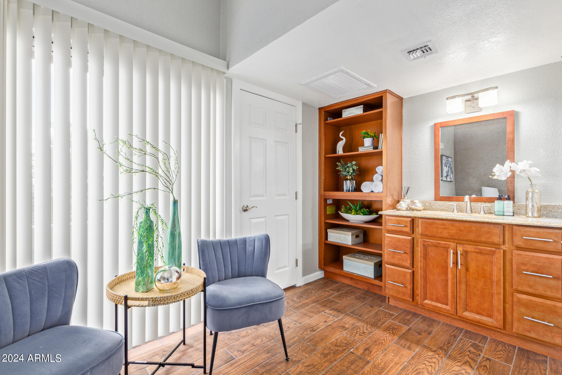 1602 East Ocotillo Road, Unit 121 Phoenix, AZ 85016 - Photo 18 of 31 a living room with furniture and a large window