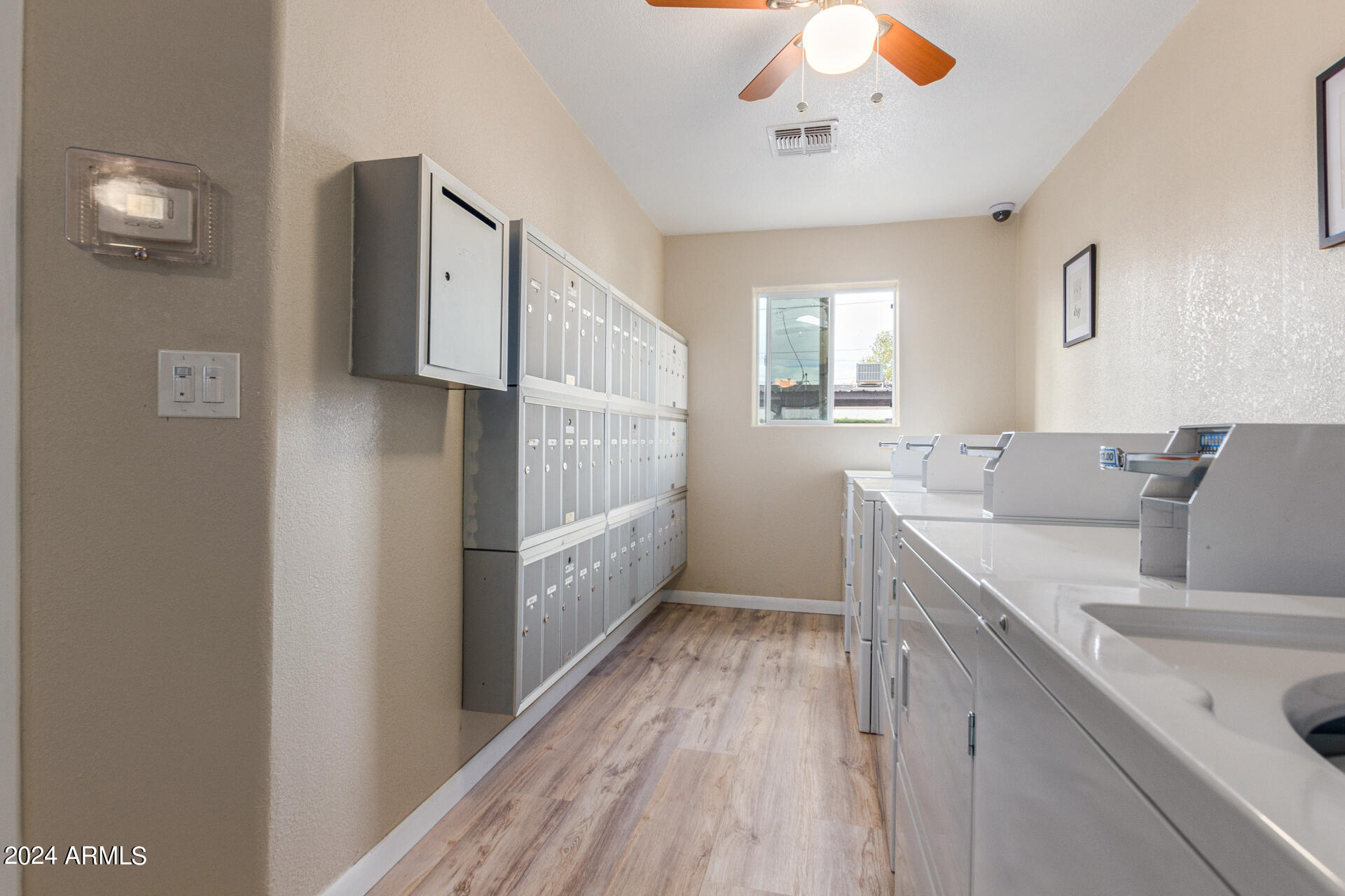1602 East Ocotillo Road, Unit 121 Phoenix, AZ 85016 - Photo 23 of 31 a view of hallway with wooden floor