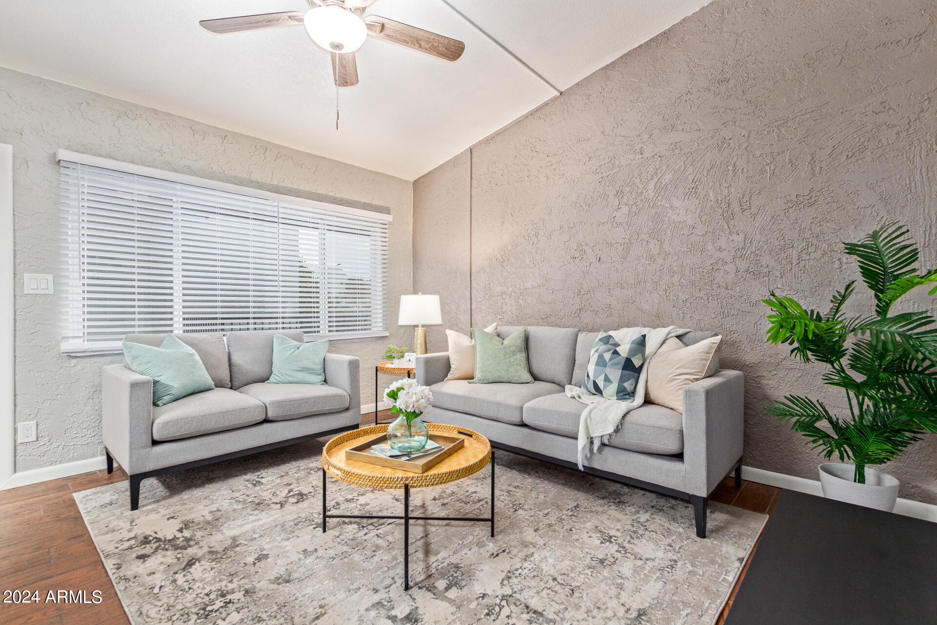 1602 East Ocotillo Road, Unit 121 Phoenix, AZ 85016 - Photo 5 of 31 a living room with furniture and a large window