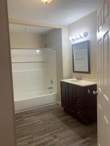 an empty room with a empty space and window