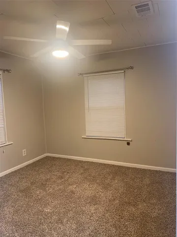 a bathroom with a sink mirror toilet and bathtub