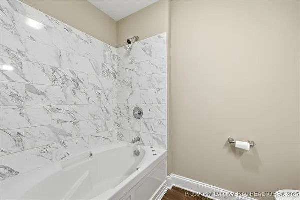 a bathroom with a bathtub