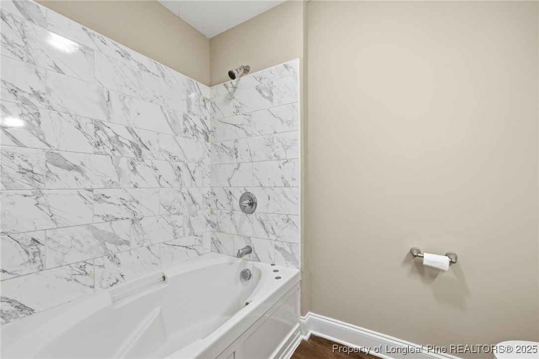 3204 Hickory Road Raleigh, NC 27616 - Photo 27 of 49 a bathroom with a bathtub