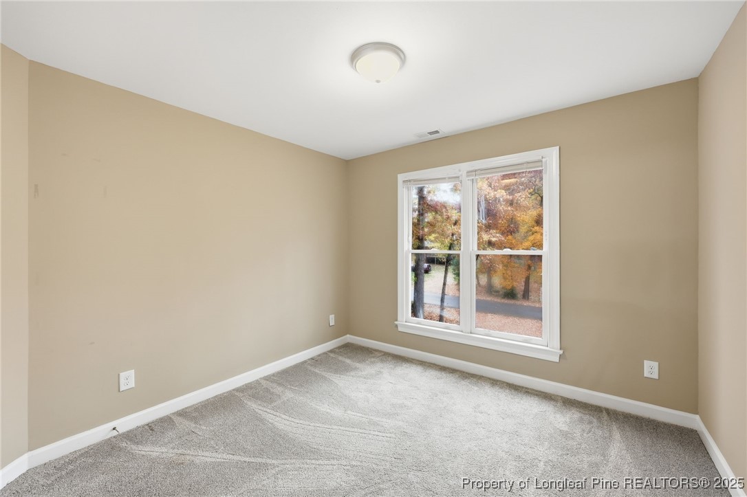 3204 Hickory Road Raleigh, NC 27616 - Photo 35 of 49 a view of an empty room with a window