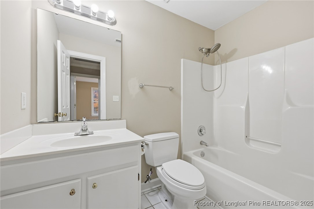 3204 Hickory Road Raleigh, NC 27616 - Photo 36 of 49 a bathroom with a sink toilet tub and shower