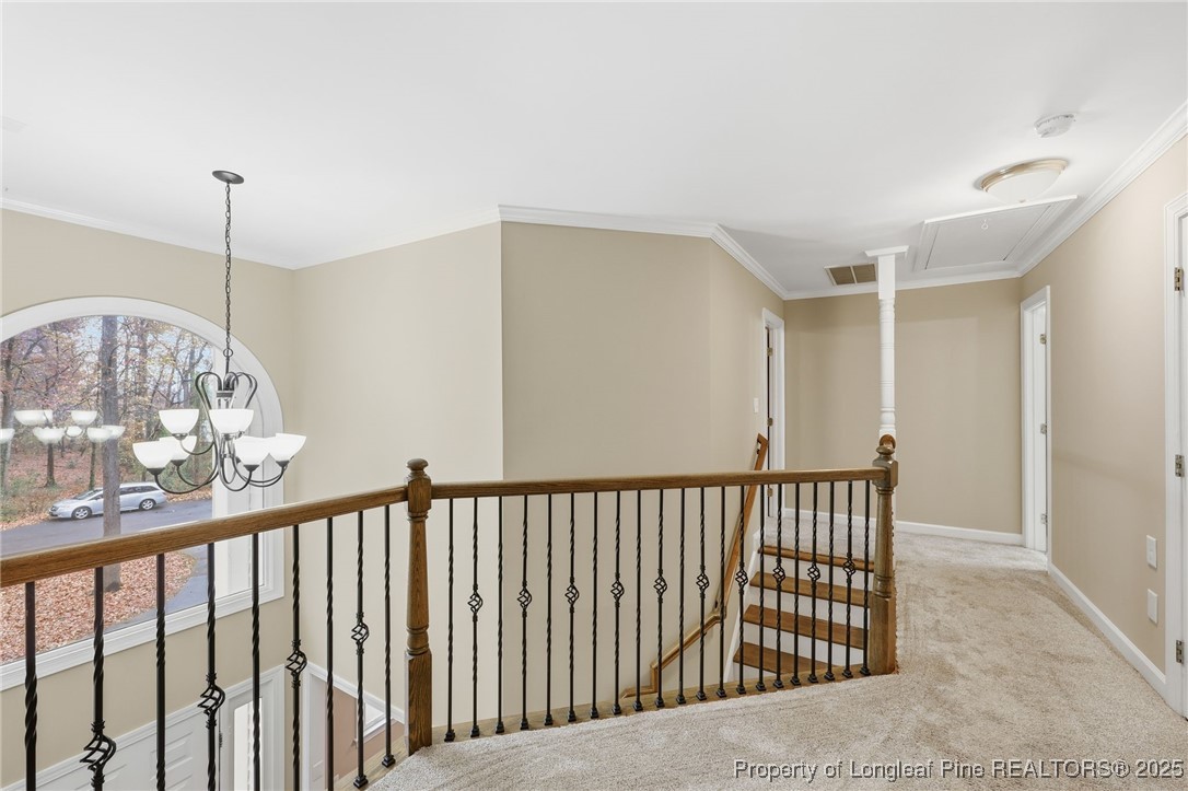 3204 Hickory Road Raleigh, NC 27616 - Photo 41 of 49 a view of a hallway with window