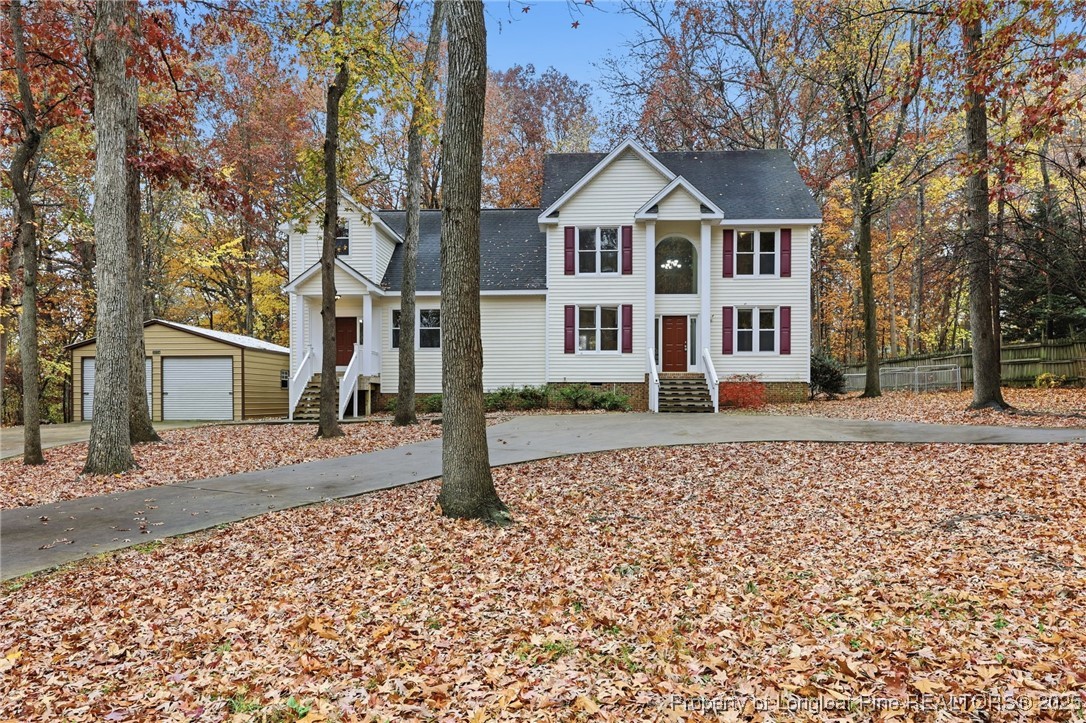 3204 Hickory Road Raleigh, NC 27616 - Photo 8 of 49 a front view of a house with a yard