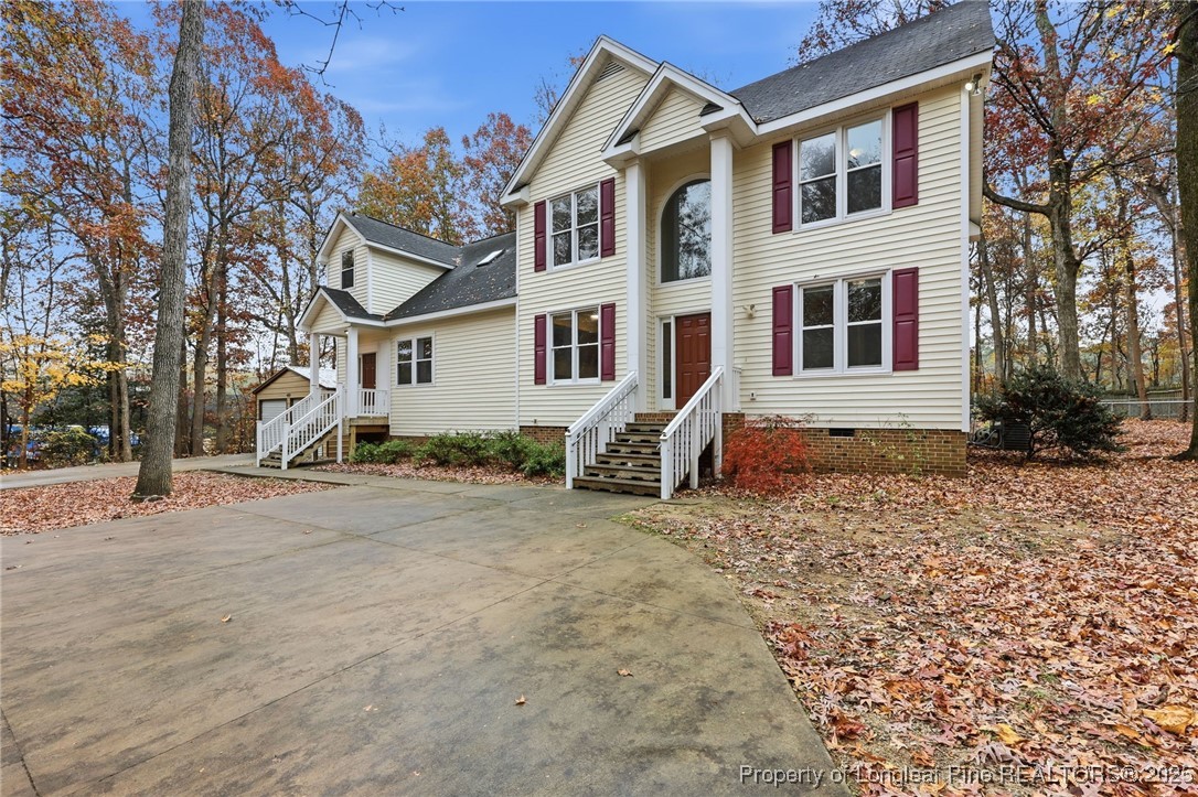 3204 Hickory Road Raleigh, NC 27616 - Photo 9 of 49 a front view of a house with a yard