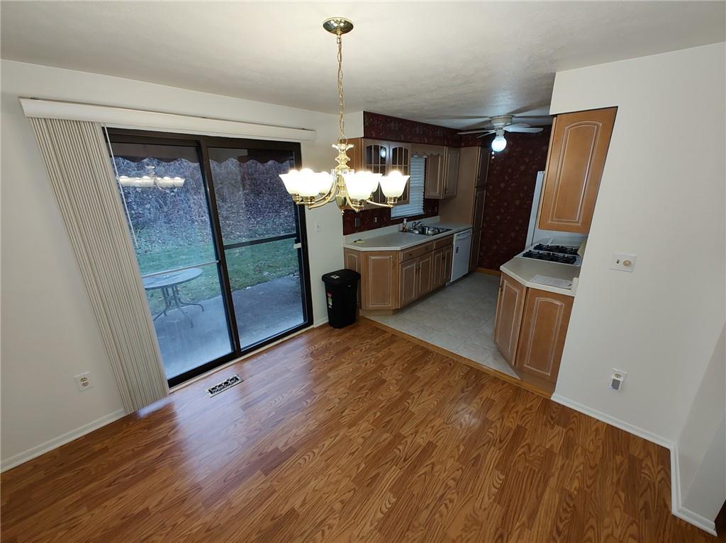 7448 Lighthouse Point Pittsburgh, PA 15221 - Photo 11 of 36 a view of a kitchen from the hallway