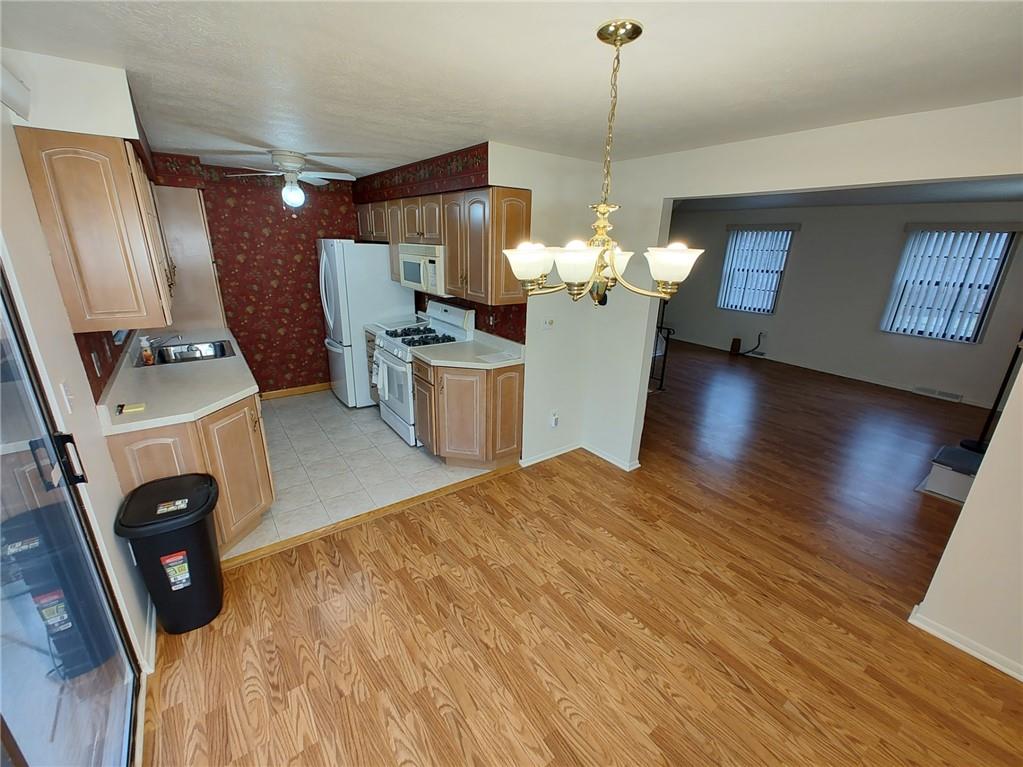 7448 Lighthouse Point Pittsburgh, PA 15221 - Photo 12 of 36 a view of a room with gym equipment