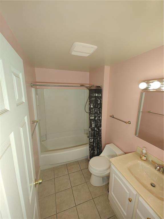 7448 Lighthouse Point Pittsburgh, PA 15221 - Photo 29 of 36 a bathroom with a sink a toilet and shower