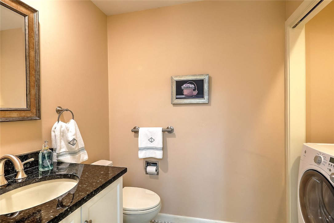 36 Bagy Wrinkle Cove, Unit 36 Warren, RI 02885 - Photo 16 of 34 Updated half bath w/laundry