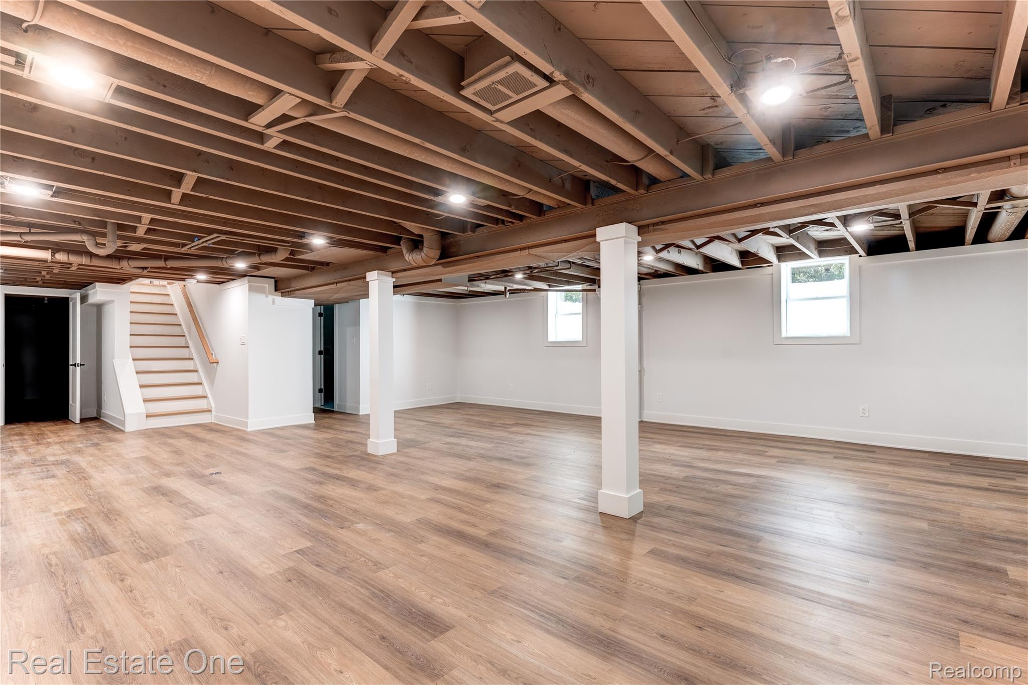 786 South Cranbrook Road Bloomfield Hills, MI 48301 - Photo 26 of 38 Basement with stairs and light wood-style flooring
