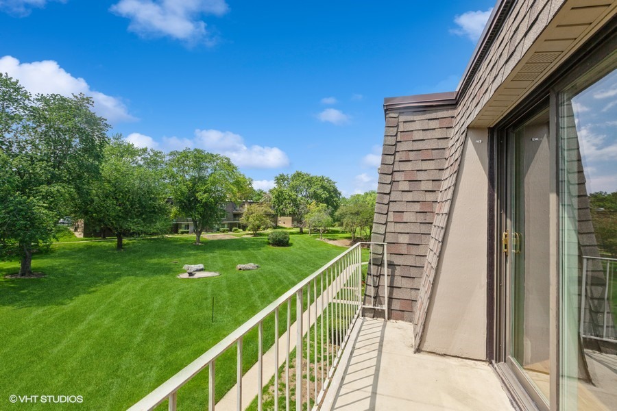238 East Bailey Road, Unit M Naperville, IL 60565 - Photo 10 of 10 a balcony with view