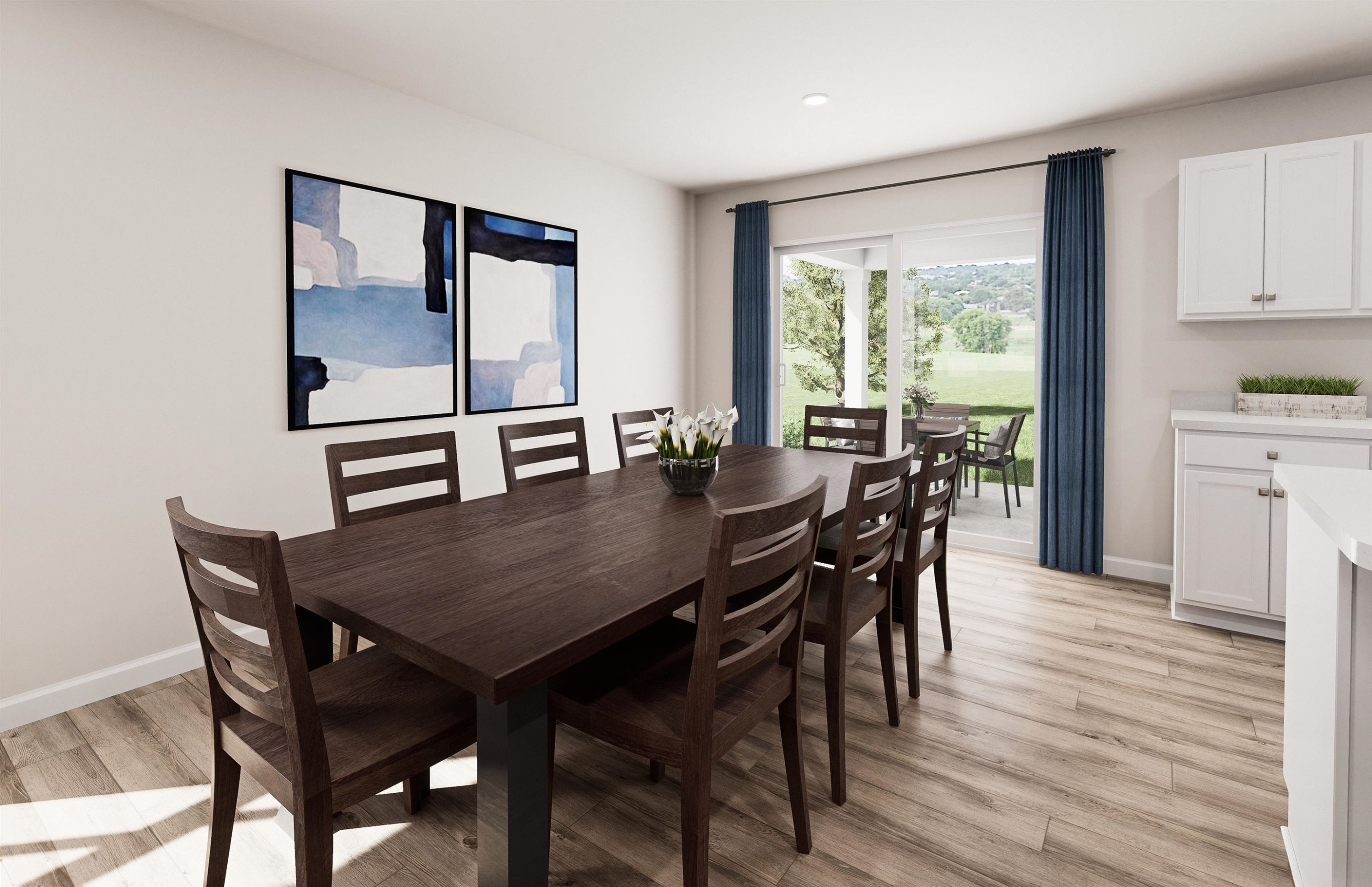 8564 Kenridge Lane Fuquay-Varina, NC 27526 - Photo 6 of 16 a view of a dining room with furniture and wooden floor