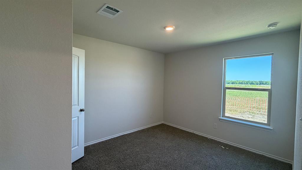 2007 Reveille Way Terrell, TX 75160 - Photo 8 of 31 an empty room with a window