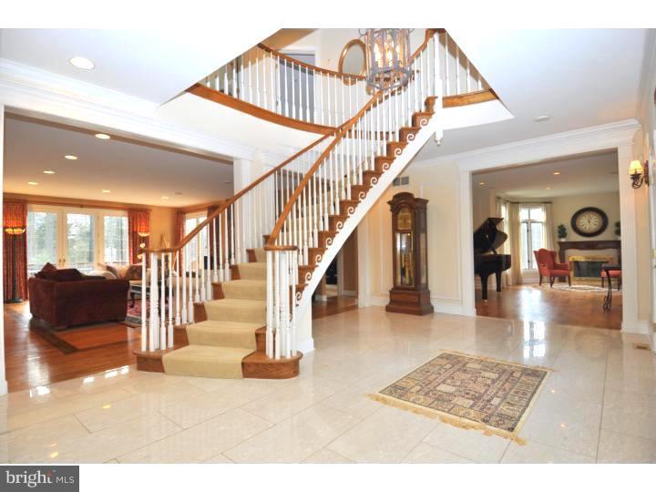 202 South Radnor Chester Road Villanova, PA 19085 - Photo 4 of 25 a view of entryway and hall with dining room