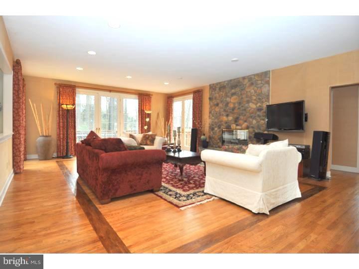 202 South Radnor Chester Road Villanova, PA 19085 - Photo 5 of 25 a living room with furniture and a large window