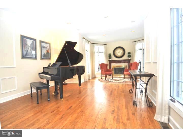 202 South Radnor Chester Road Villanova, PA 19085 - Photo 7 of 25 a living room with furniture and a wooden floor