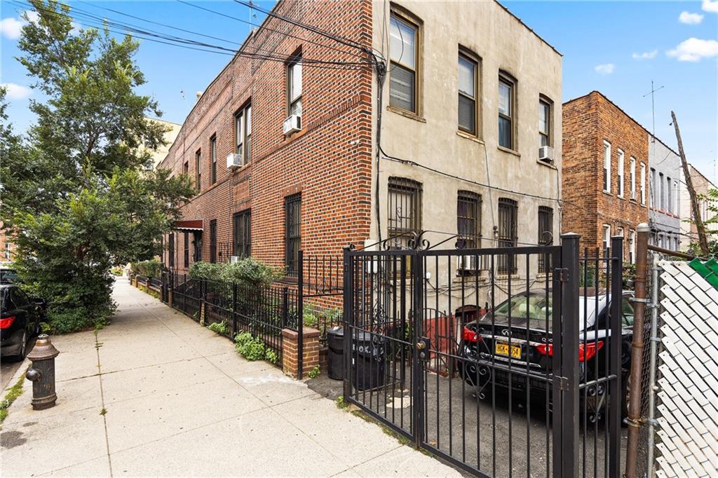 1088 Lenox Road Brooklyn, NY 11212 - Photo 3 of 9 a view of a building with many windows