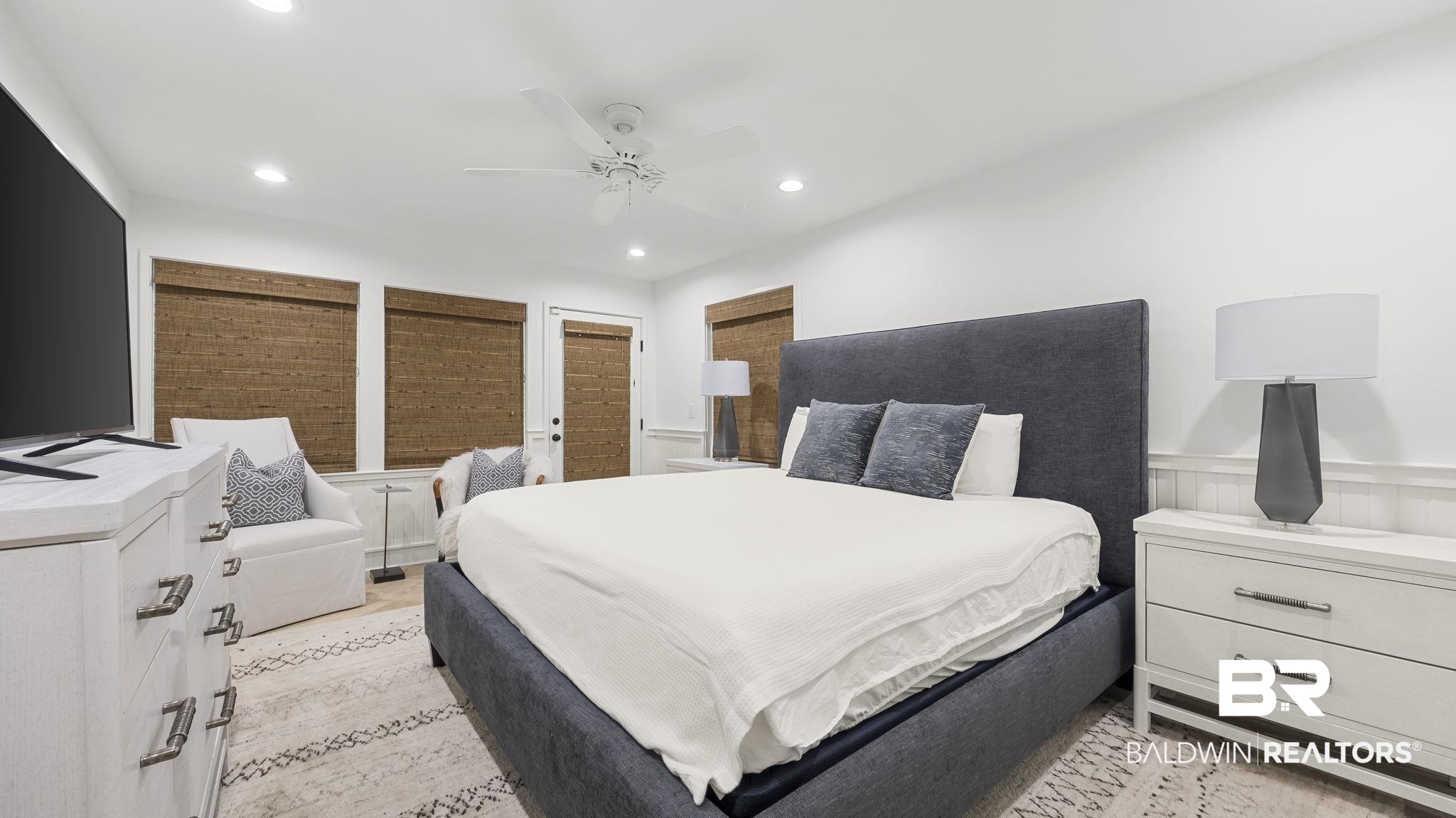 30194 River Road Orange Beach, AL 36561 - Photo 29 of 45 Bedroom with ceiling fan, a wainscoted wall, and recessed lighting