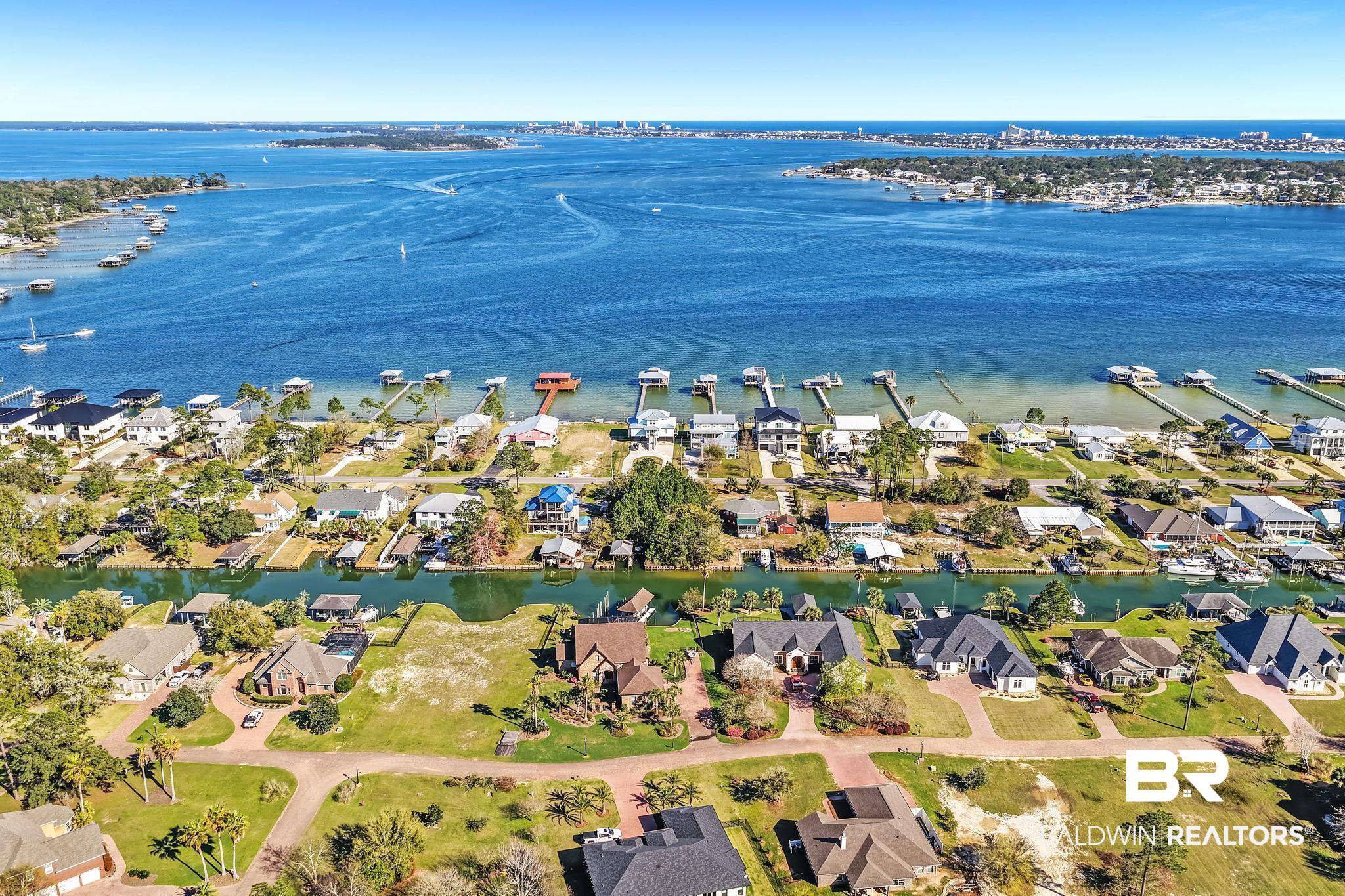 6434 County Road 95 Elberta, AL 36530 - Photo 93 of 99 Aerial perspective of suburban area featuring a large body of water