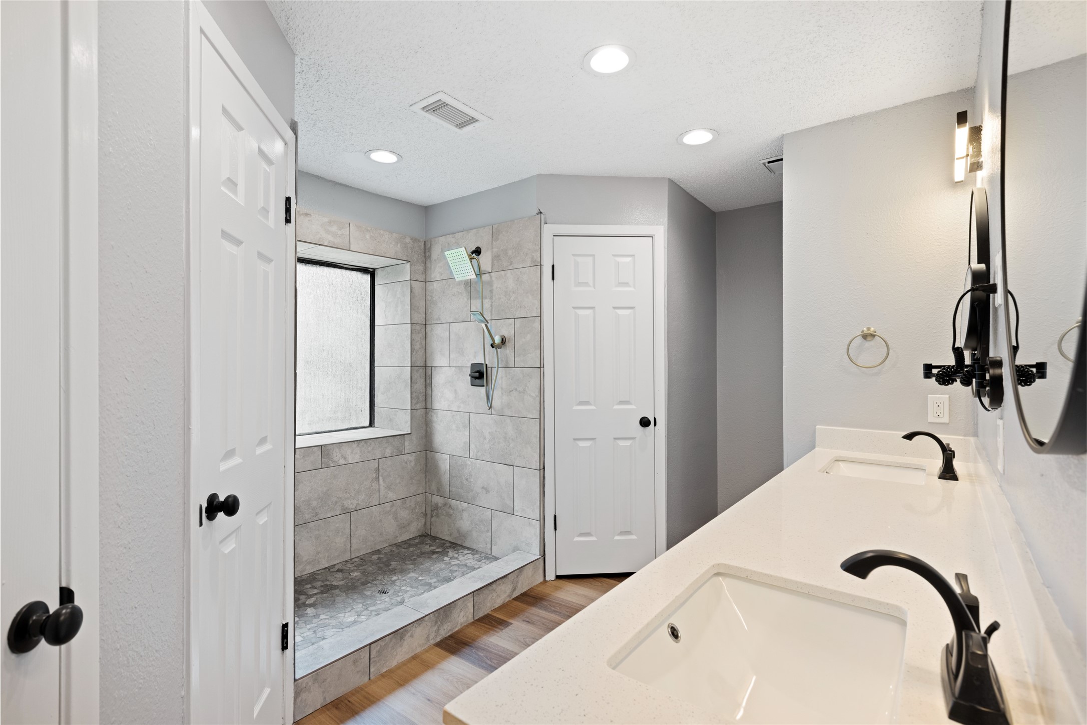 2314 Peaceful Valley Drive Spring, TX 77373 - Photo 12 of 20 a bathroom with a tub shower and mirror