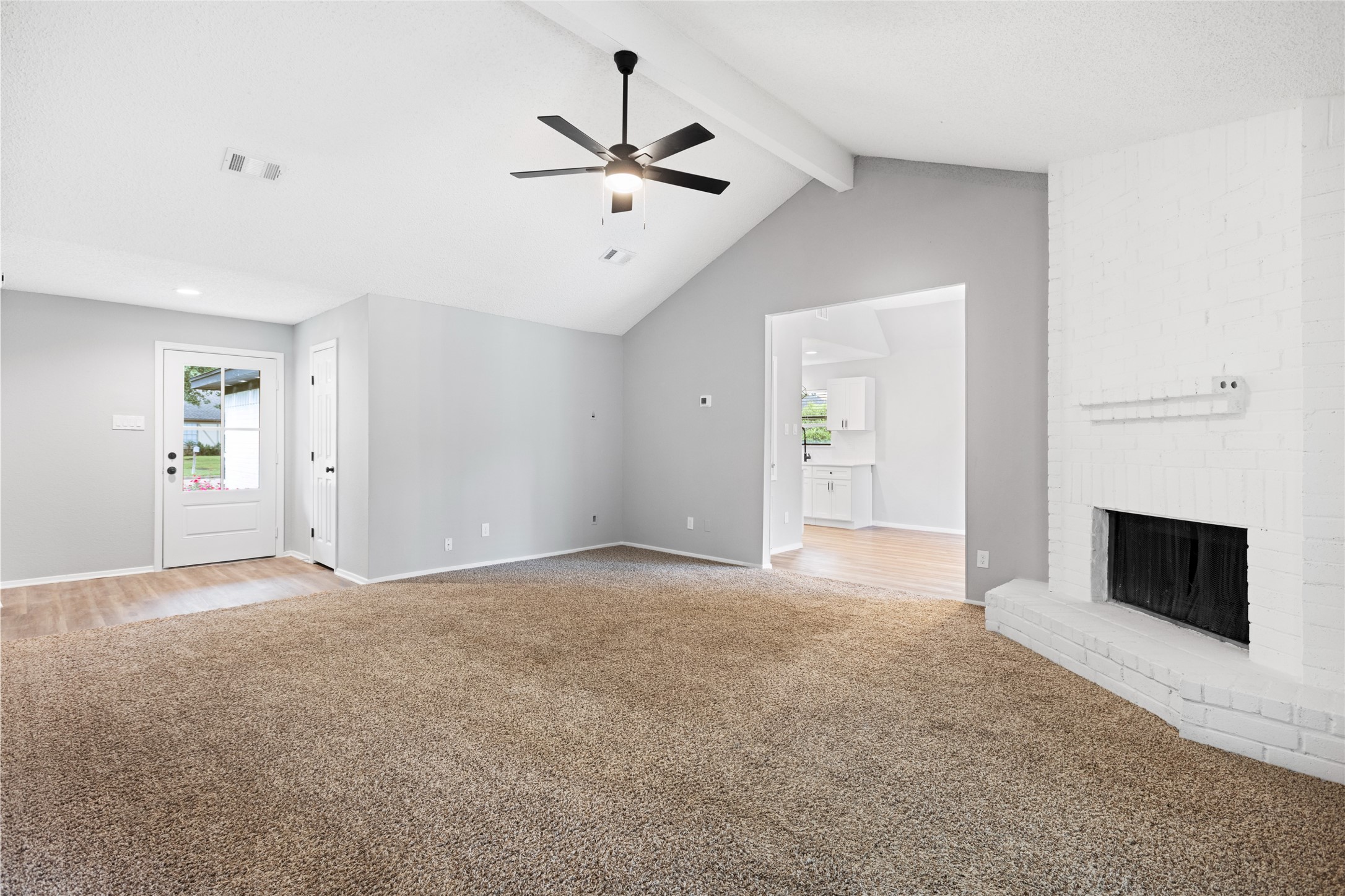 2314 Peaceful Valley Drive Spring, TX 77373 - Photo 6 of 20 an empty room with windows and fireplace