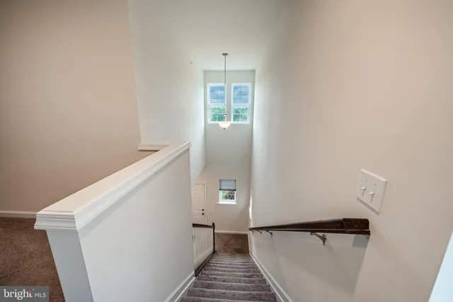 a view of a hallway with closet