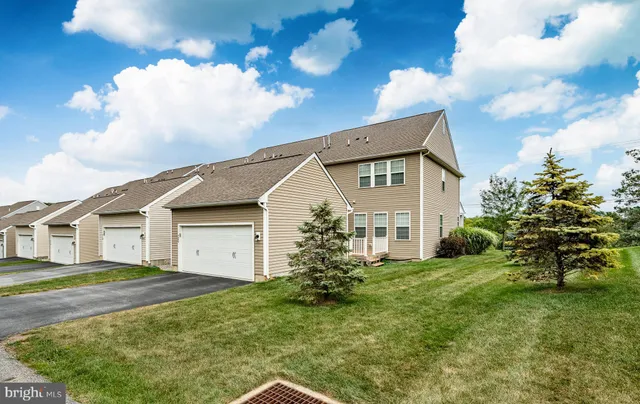 a view of a park with a slide